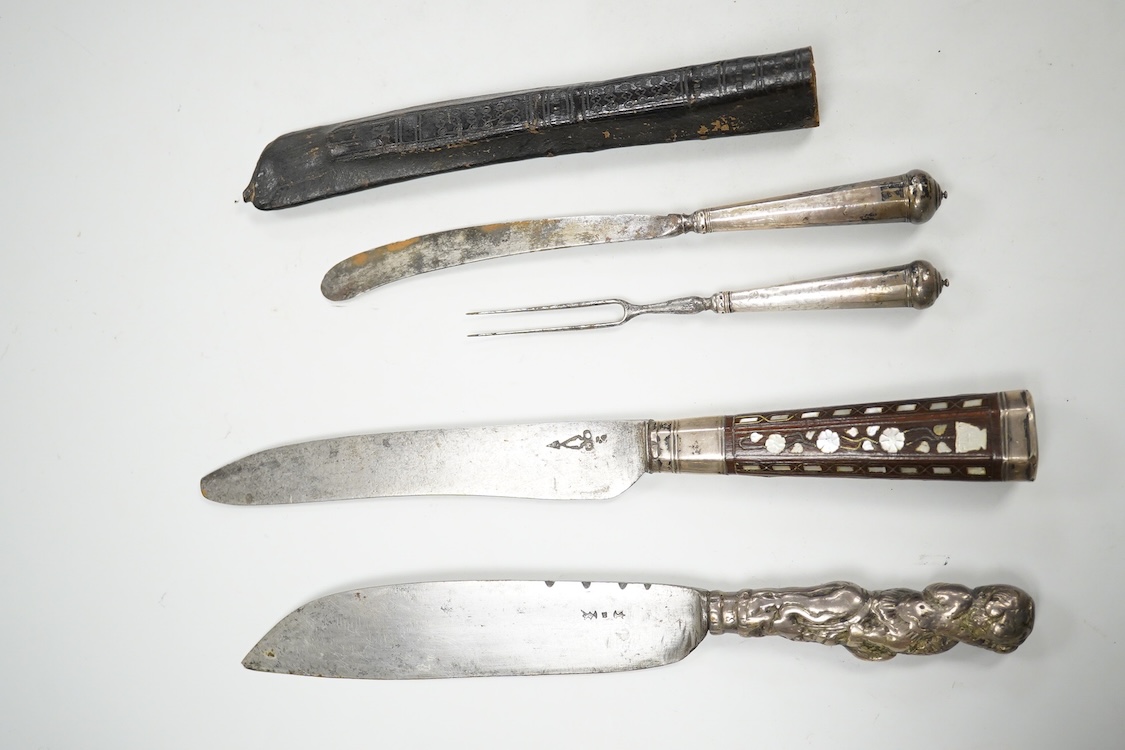 Three 17th / 18th century steel bladed knives, one in a leather sheath with matching fork. Longest 24cm.